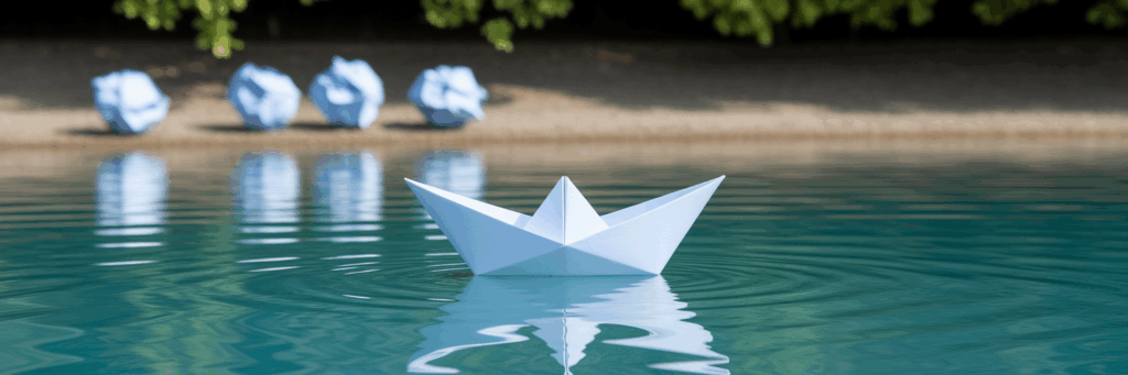 Crafted paper boat sailing smoothly