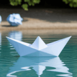 Crafted paper boat sailing smoothly